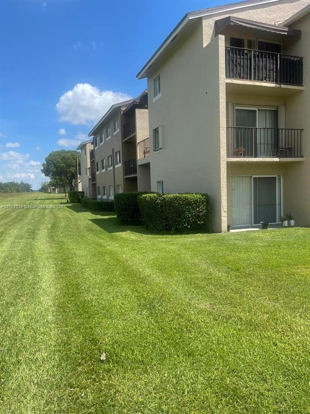 Photo of 1089 N Benoist Farms Rd #107, West Palm Beach, FL 33411 (MLS # A11671339)