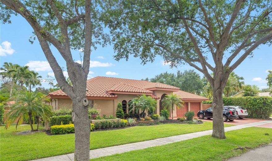 ONLY $221/Month HOA!  Unveil your captivating backyard oasis on this corner lot!  This beautifully renovated home boasts a resort-style water park and a pickle ball/tennis/basketball court.  Enjoy open-concept design with vaulted ceilings and sliding door walkouts from every room facing the resort style pool.  Open concept kitchen is fully remodeled with new quartz countertops with waterfall and stainless steel appliances.  New bathrooms with a Jacuzzi jet tub in the master bedroom.  All appliances and both air conditioning systems are new.  Professionally landscaped and highly upgraded throughout.
