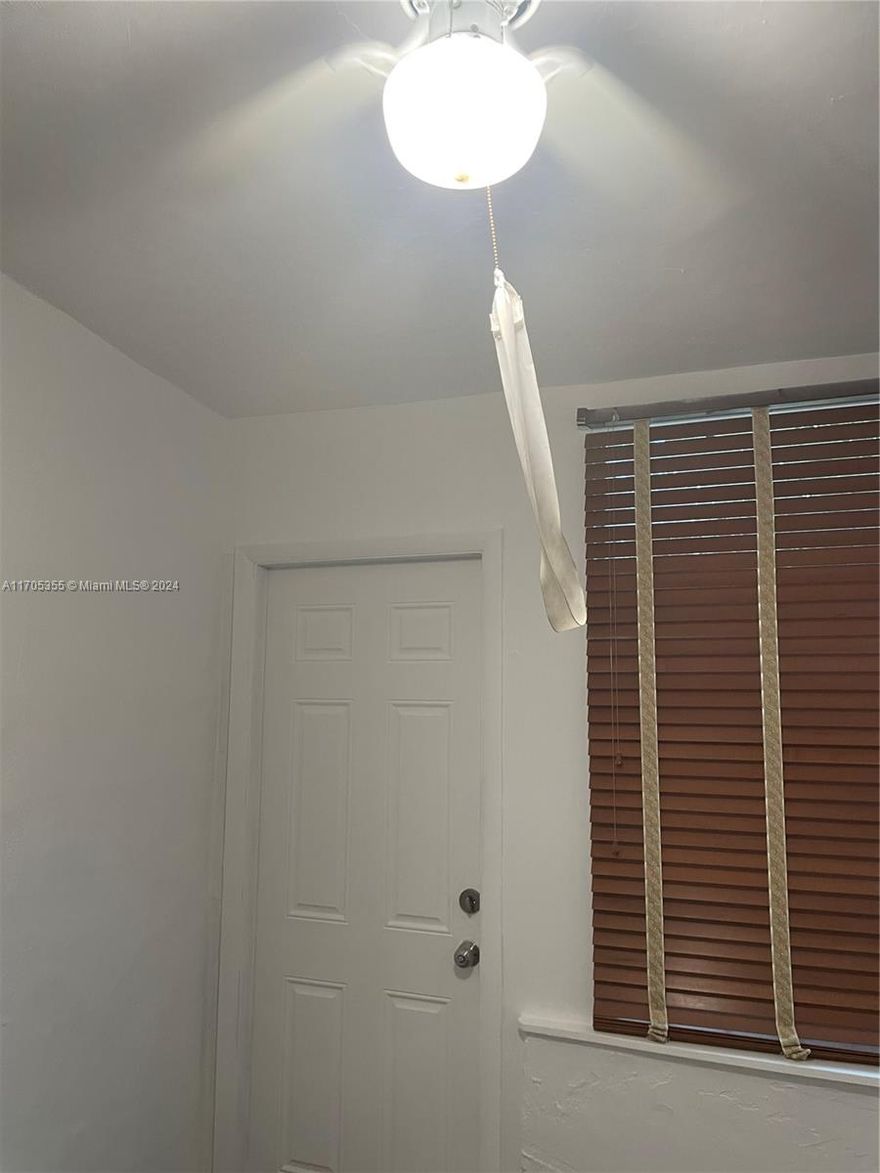 Step into 2 bedroom 1 bathroom home situated the desirable 33181 zip code