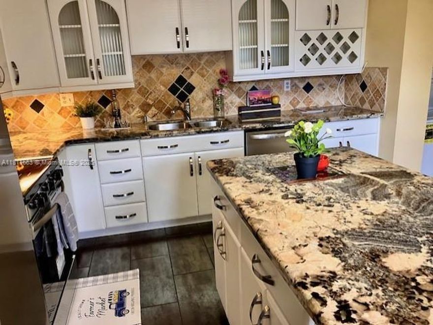 PRICE CORRECTION . Very beautiful resort style home. Lots of light and air. Large (1,770 sq.ft.) split plan 3 bed/2.5 bath. Completely remodeled kitchen with brand new S/S appliances. New tiles in kitchen, living room and primary bedroom. Large, screened patio overlooking a tropical garden. Gated entrance. Assigned parking (B29). Extra storage space on the same floor. Washer/dryer inside.  Walk-in closets. One occupant must be 55+. Purchaser (no age limit) must have 710 credit score, $45,000 income,20% escrow when financing, 6 months maintenance deposit refundable after 18 months, no rent 1st year. Maintenance includes heated pool, gym, ballroom, library, cable, internet, water, 24-hour security, outdoor grill, insurance, car wash. NO special assessment. 40-year certification completed.