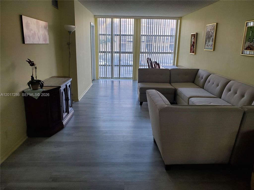 Photo of 501 Three Islands Blvd #203, Hallandale Beach, FL 33009 (MLS # A12017286)
