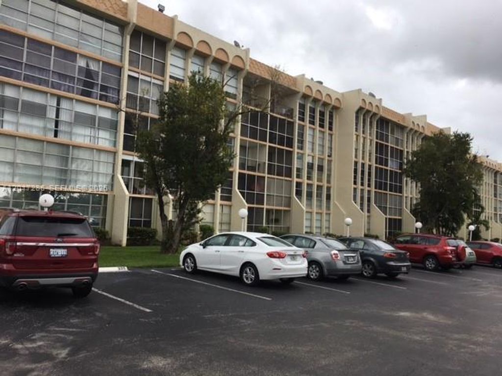 Photo of 501 Three Islands Blvd #203, Hallandale Beach, FL 33009 (MLS # A12017286)