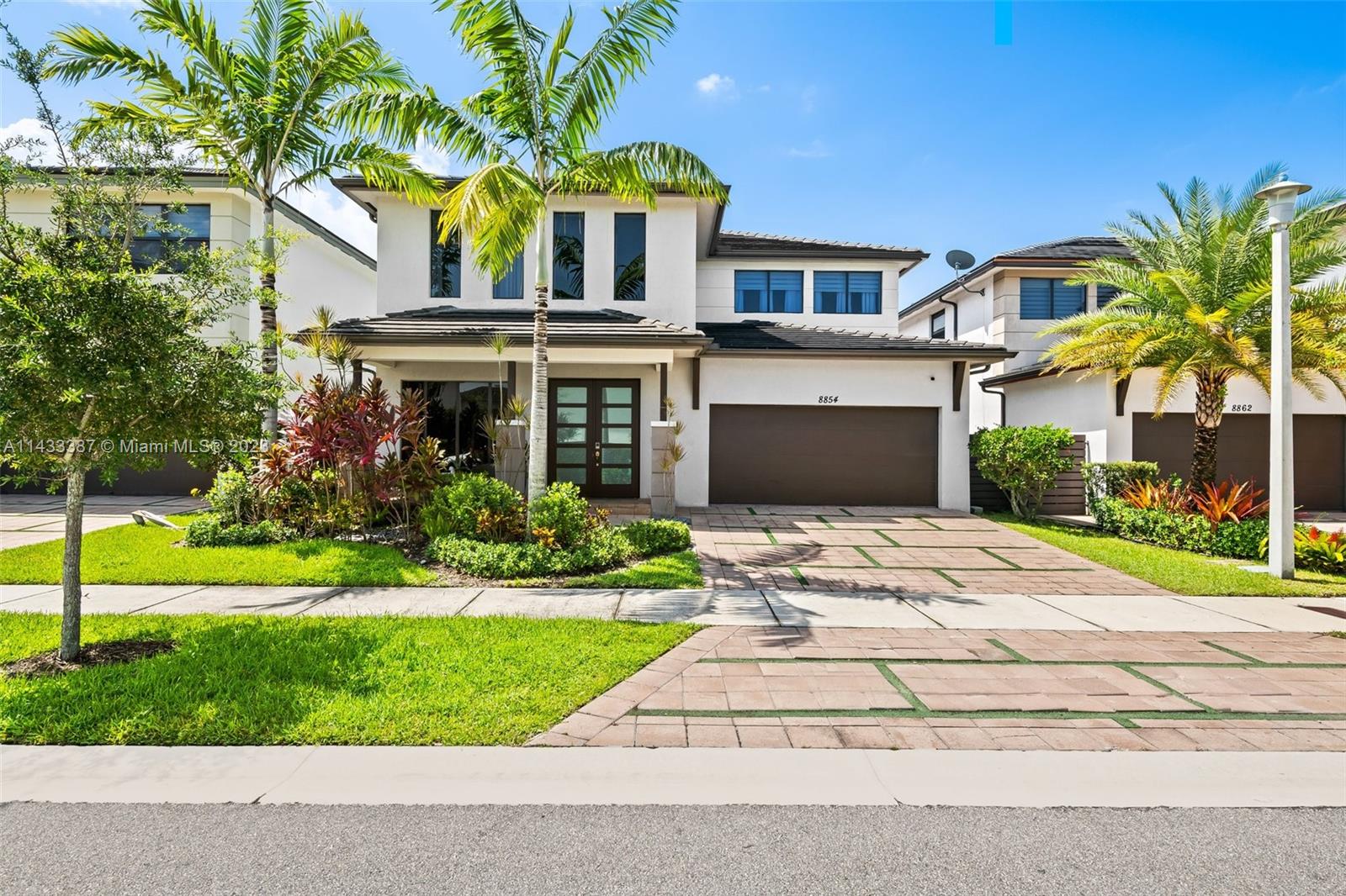 Welcome to this stunning gem nestled in the heart of Miami Lakes. This 4 bedroom, 3 bathroom residence offers a harmonious blend of modern elegance and comfort. The open-concept living spaces and high ceilings are bathed in natural light, creating an inviting ambiance. Step outside to your own private oasis – perfect for hosting gatherings or unwinding after a long day. Entertain guests at this tropical retreat - including a full outdoor kitchen, and saltwater cascading pool. Satori is a beautiful modern, gated residential community of newer construction, built in 2017. It offers beautiful amenities such as a state of the art clubhouse, gym, pool and much more! This is an exceptional opportunity to own a piece of Miami Lakes luxury. Come experience the lifestyle this home has to offer!