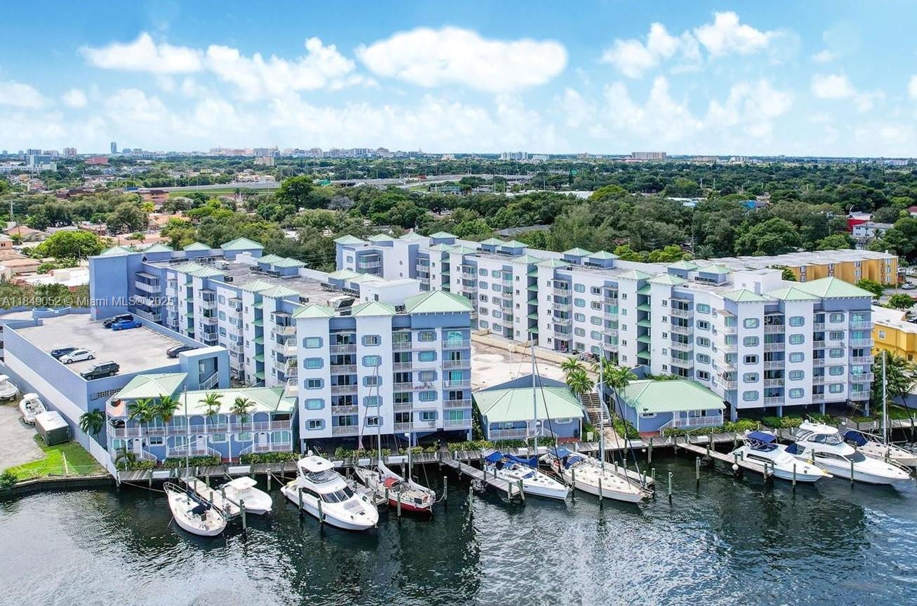 Excellent investment opportunity. Spacious 2-bedroom 2-bathroom apartment with an open balcony at the Miami River with view into the greenery. Comfortable split floor plan with ample-sized bedrooms and spacious closets. Full-size washer and dryer in the unit. 1 assigned garage parking space. Nestled in a quiet gated community with 24 hours security guard. Easy access to Miami International Airport, River Landing shops and 836 Expressway. A perfect blend of urban convenience and riverside tranquility in this prime Miami location. Unit was rented at $2,450 per month until July 2025 (6% cap rate) - now vacant for the convenience of any type of buyers.