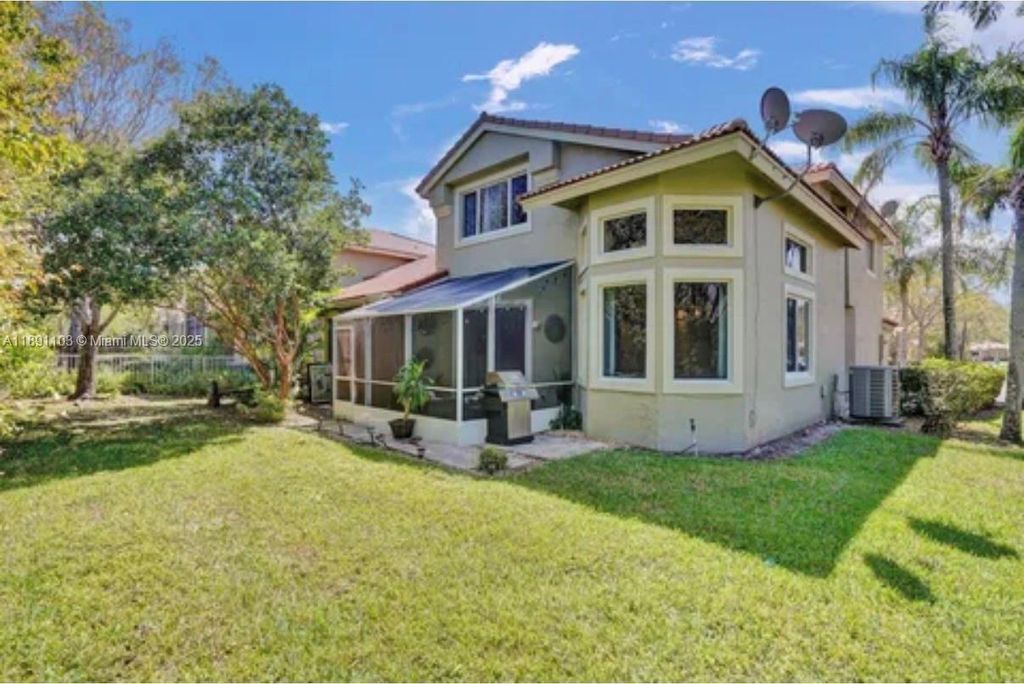 Photo of 12591 NW 57th Pl #12591, Coral Springs, FL 33076 (MLS # A11891103)