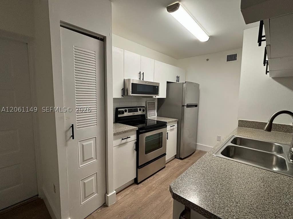 Photo of 460 S Park Rd #101, Hollywood, FL 33021 (MLS # A12061149)
