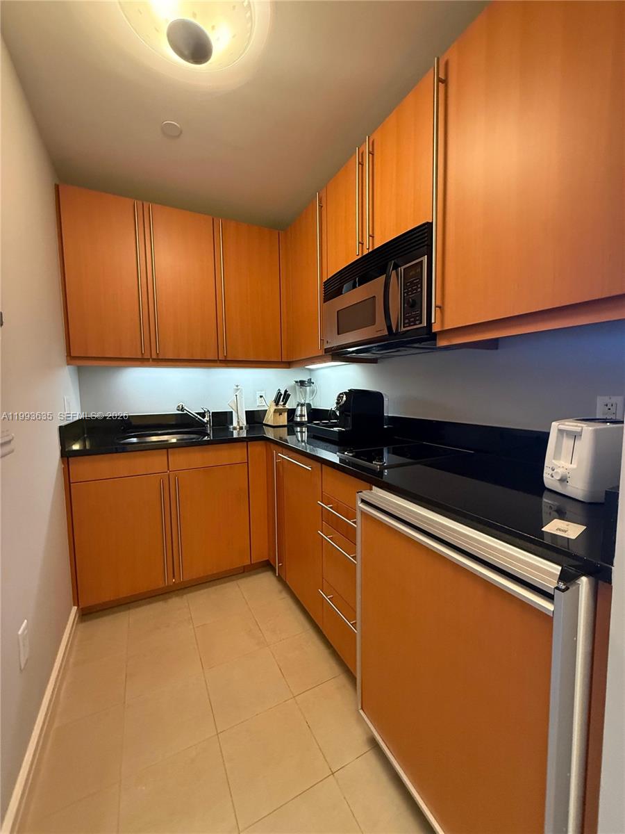 MILLENNIUM TOWER CONDOMIN - Residential