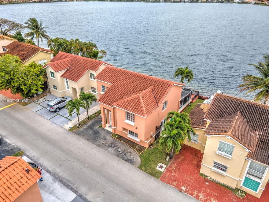 Amazing House in a unique location 2 Story with super long lake views featuring 4 bedrooms and 2.5 baths. Beautiful private huge waterfront wood deck for entertaining while enjoying the wonderful views, BBQ, or go kayaking. Location!!.. Close To FIU, Dolphin Mall and International Mall, A Public and private schools, easy access to the Turnpike. Lake Pointe clubhouse with community pool.