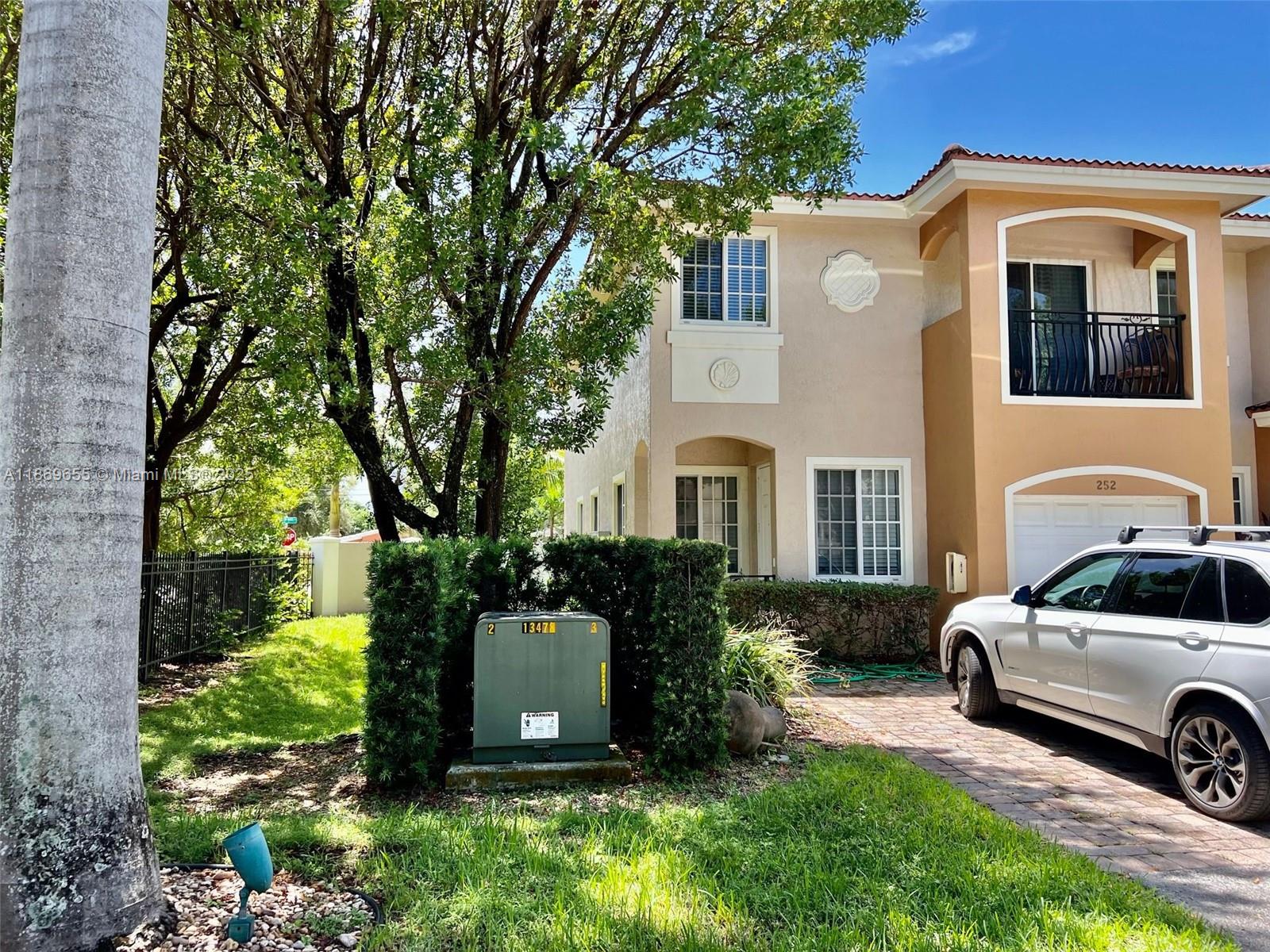 Spectacular 3/2 1/2 updated corner townhouse in a small secure gated community with pool. Unit is fully furnished and shows very well. Centrally located minutes to beaches, shops, restaurants and major highways.