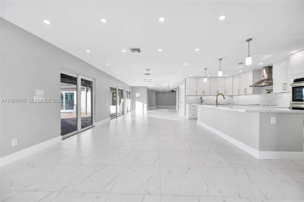 Photo of 4010 NW 99th Ave, Coral Springs, FL 33065 (MLS # A11987950)