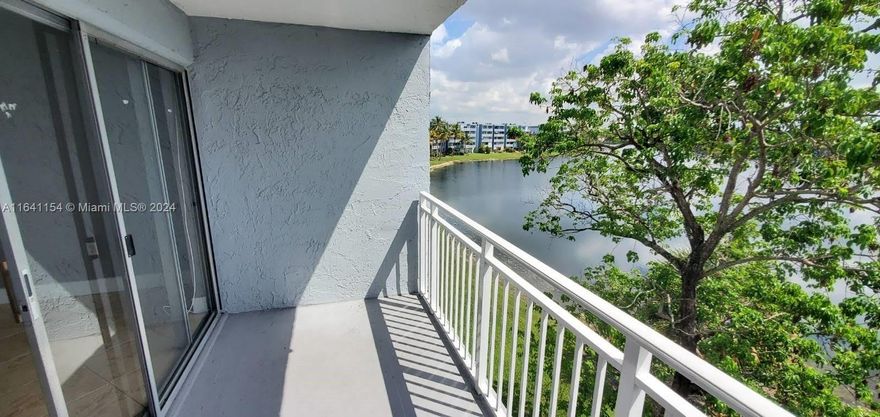 INVESTORS - condo currently rented with lease until 1/31/26 generating $2,000 a month! Charming and spacious condo located in the vibrant Fontainebleau area of Miami. This beautifully designed 1 bed, 1.5 bath unit features an open floor plan that maximizes space and natural light, creating a warm and inviting atmosphere. **EXTRA ROOM that can be used for a second bedroom or office**TWO assigned parking spaces, lake views from both balconies, washer & dryer inside unit, and access to amenities such as: swimming pools, basketball court, tennis court, playground, clubhouse and more! Conveniently located near shopping, dining, and major highways, this property offers the perfect blend of comfort and accessibility.  Building has already passed 40 yr certification.