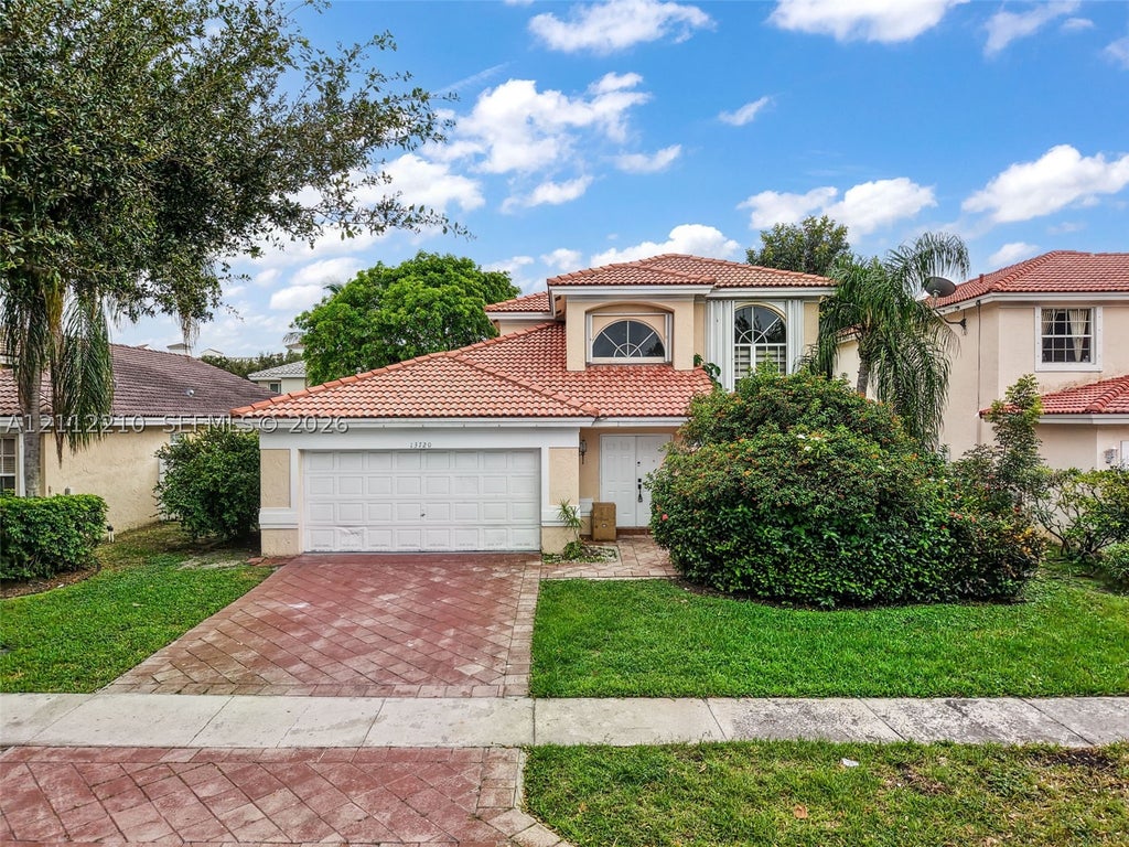 Photo of 13720 NW 22nd Pl, Sunrise, FL 33323 (MLS # A12112210)