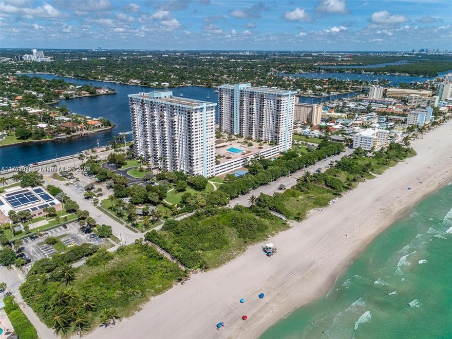 TAKE ADVANTAGE OF THIS UPGRADED SPLIT 2 BEDROOM 2 BATH CONDO ON HOLLYWOOD BEACH! UPDATED KITCHEN WITH HICKORY WOOD CABINETRY,QUARTZITE COUNTERTOPS, AND NEW ELECTRICAL PANEL. MARBLE FLOORS, NO POPCORN CEILING, UPDATED LED LIGHTING, IMPACT WINDOWS AND DOORS WITH NEW WINDOW TREATMENTS. ALMOST 1600 SQ FT WITH 2 PRIMARY BEDROOMS AND BATHROOMS, POOL LEVEL WITH INTRACOASTAL AND OCEAN VIEWS FROM LARGE COVERED BALCONY. DEEDED GARAGE PARKING AND WASHER/ DRYER IN UNIT. COUNTRY CLUB LIFESTYLE AT THE SUMMIT WITH 24 HR SECURITY, 2 HEATED POOLS, RESTAURANT, TENNIS COURTS, PICKLEBALL, BASKETBALL, GYM, SHUFFLEBOAD, SOCIAL ACTIVITIES AND MORE. 15 MINS FROM FLL AIRPORT AND AVENTURA MALL.