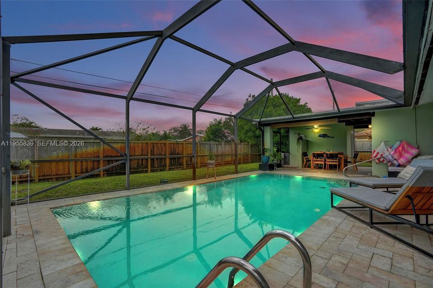 Come tour this 3bed/2.5bth pool home located in the charming Riverland(No-HOA) area of Fort Lauderdale. A beautifully screened-in pool area-perfect for entertaining and close proximity to major highways, the airport, and downtown Ft Lauderdale and No HOA make this updated home perfect as a Primary Residence or for an Investor!  Enjoy the convenience of an outdoor shower and poolside bathroom, ideal for guests.  The spacious open kitchen offers a bright white design with abundant cabinetry, stainless steel appliances , and a dishwasher, along with a pass through that fills the home with natural light.  The inviting living area feels cozy and welcoming as you step through the front door, while the separate dining room comfortably accommodates a large table for gatherings.  Additional highlights include Impact Windows and Doors, a Roof replaced in 2019, and a convenient carport.