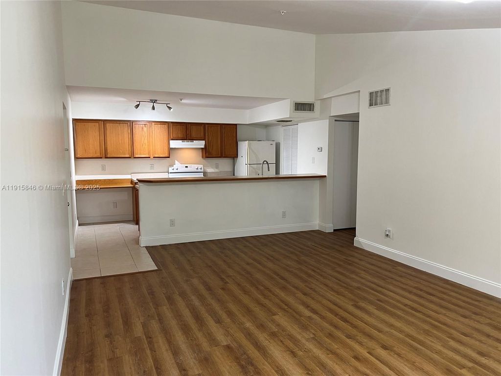 Photo of 9905 Westwood Dr #32-3, Tamarac, FL 33321 (MLS # A11915846)