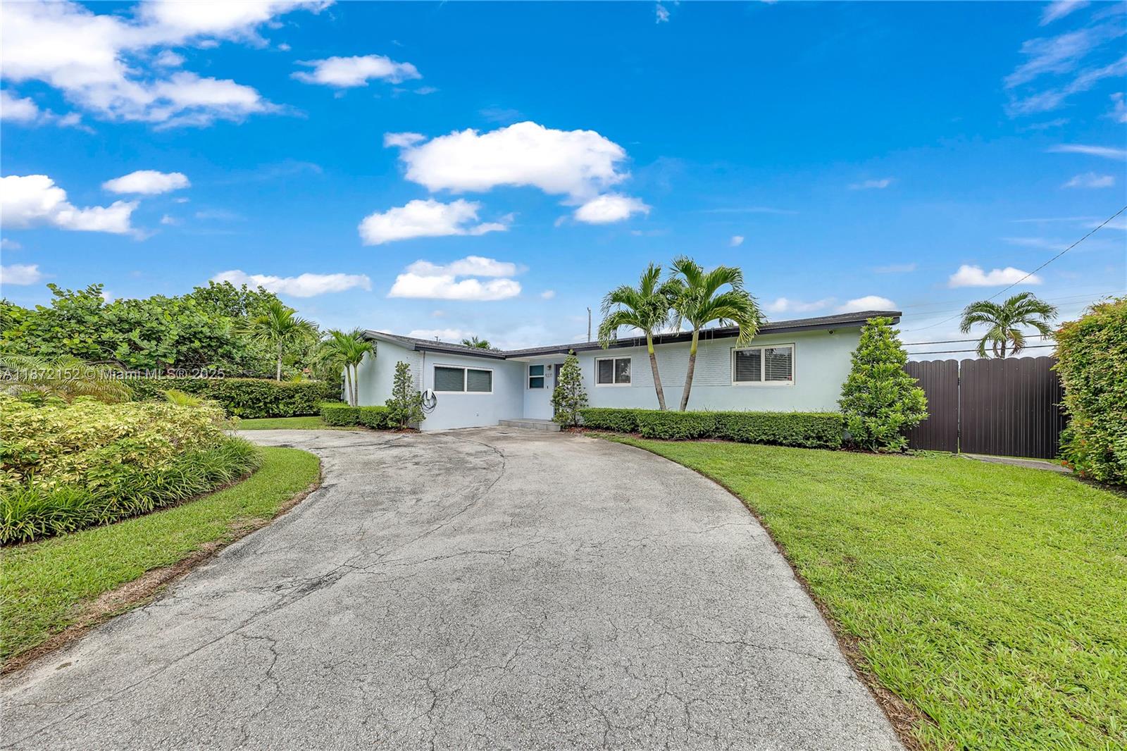 This beautifully updated 3-bedroom, 2-bath pool home that blends modern upgrades with effortless comfort. From the moment you arrive, you’ll notice the meticulous care and investment that make this home truly move-in ready. Inside, enjoy a bright, open layout featuring impact windows and doors, a legally converted garage currently serving as a private nanny’s room, and a seamless flow to the outdoor living space. Every major system has been thoughtfully updated, including new roof, PVC plumbing (cast iron removed), wood burning fireplace, completely resurfaced pool and patio, ensuring peace of mind for years to come. Step outside to your personal oasis—an expansive backyard with sparkling pool, perfect for entertaining, family gatherings, or quiet relaxation.