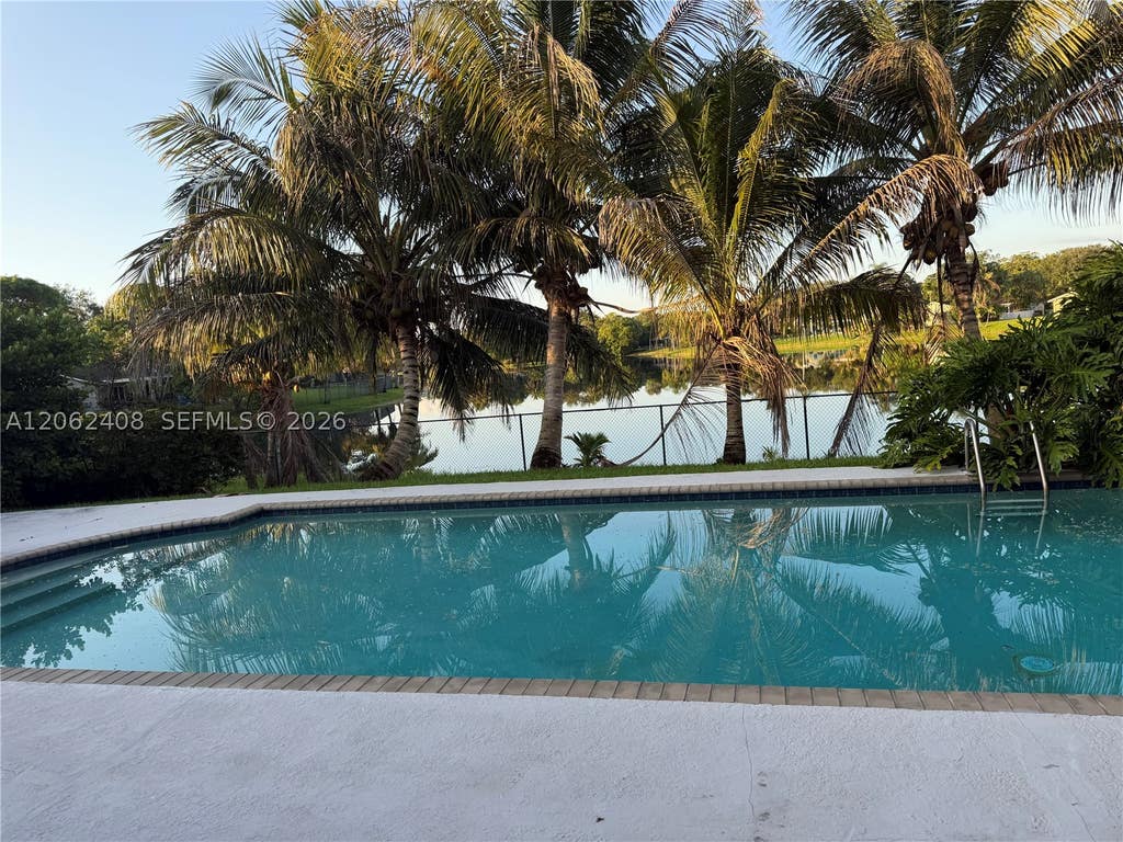 Photo of 11905 Sailboat Dr, Cooper City, FL 33026 (MLS # A12062408)