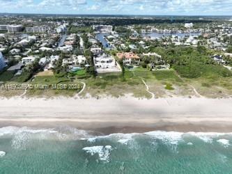 Rare opportunity to enjoy a private ocean getaway perfectly located on Delray Beach's most coveted A1A location. Nestled in a boutique enclave, this Penthouse is a picturesque two-story condominium building with private elevator offering 3 bedrooms 2.5 baths, woodburning fireplace, impact glass & over 2,700 sq. ft. of living space. Enjoy a private Florida room overlooking the pool which is perfect for relaxing or entertaining family and friends. Bright open floorplan offers spacious living area with ceramic tile floors, updated granite kitchen and top of the line stainless steel appliances. There is reserved parking for multiple vehicles as well. Bike or walk just across the street to Delray's most pristine beach with sparkling blue ocean waters and the acclaimed Atlantic Dunes Park.