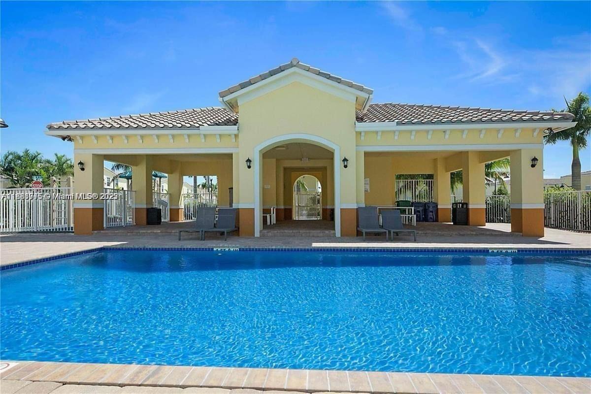 WELCOME TO THIS SPECTACULAR TOWNHOUSE LOCATED IN A GATED COMMUNITY. 3 BEDROOMS AND 2 AND HALF BATHROOMS. THIS WELL KEPT TOWNHOUSE FEATURES A MODERN OPEN-CONCEPT LAYOUT, HIGH CEILINGS, STAINLESS STEEL APPLIANCES, WASHER AND DRYER INSIDE THE UNIT. THE PROPERTY IS EQUIPPED WITH SMART HOME FEATURES FOR MORE CONVENIENCE. CERAMIC ON THE FIRST FLOOR AND LAMINATE WOOD ON SECOND FLOOR. ENJOY THE SPACIOUS MASTER BEDROOM WITH A WALK IN CLOSET. THIS PROPERTY HAS ONE CAR GARAGE AND ROOM FOR ANOTHER TWO. YOU CAN ALSO RELAX AT THE COMMUNITY POOL AND BACKYARD.