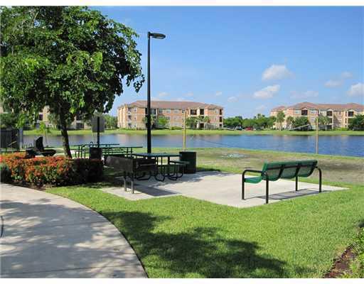 IMMACULATE UNIT, THE BEST AREA IN MIRAMAR, PORCELAIN TILE, CROWN MOLDING, OPEN FLOOR PLAN. WASHER AND DRYER IN THE UNIT. GATED COMMUNITY ENTRANCE, RESORT-STYLE AMENITIES, BILLIARD ROOM, STATE-OF-THE-ART FITNESS CENTER, INDOOR BASKETBALL, MEDIA ROOM, PARTY ROOM AND BAR WITH KITCHEN FACILITIES, BUSINESS CENTER AND LIBRARY.