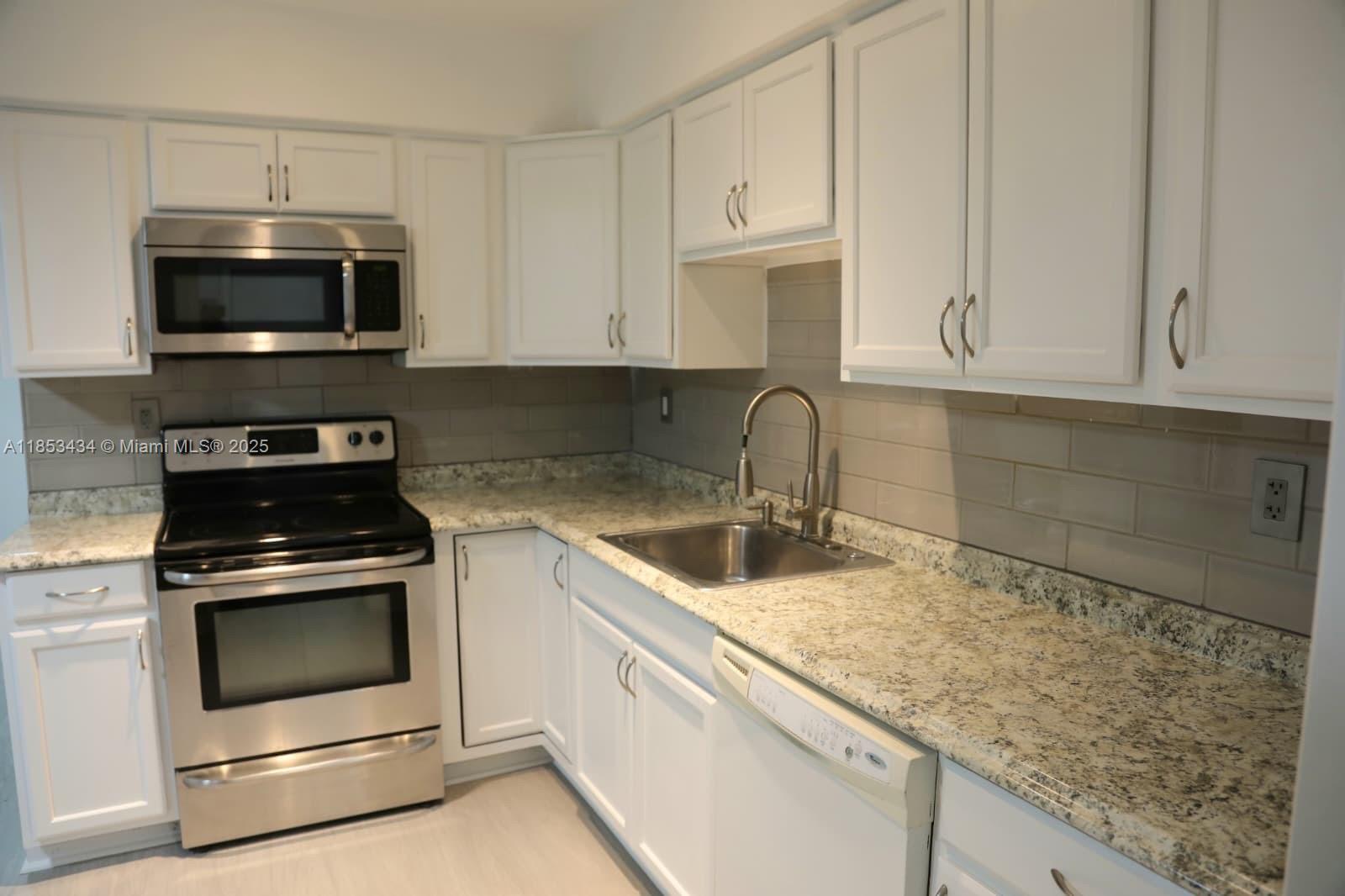 THIS IS A TRUE 3/1! Just fully remodeled and ready to move in for the very first time! Luxury vinyl floors throughout—NO CARPET. NO HOA APPROVAL – FAST MOVE-IN. CORNER LOT with MASSIVE BACKYARD—owner will install a white elegance vinyl fence for total privacy. Exterior will be freshly painted this week. The third bedroom is HUGE. Spacious laundry room. Bright layout, generous rooms, and peaceful location. All rooms feature brand-new ceiling fans. Double driveway plus side parking. Super quiet street with no traffic—ideal for relaxed living. Prime location with easy access to 441, Turnpike, and I-95. ONLY FIRST MONTH AND ONE MONTH SECURIT DEPOSIT REQUIRED – LOW MOVE-IN COST! This home checks all the boxes—space, privacy, updates, and location. Don’t miss it!