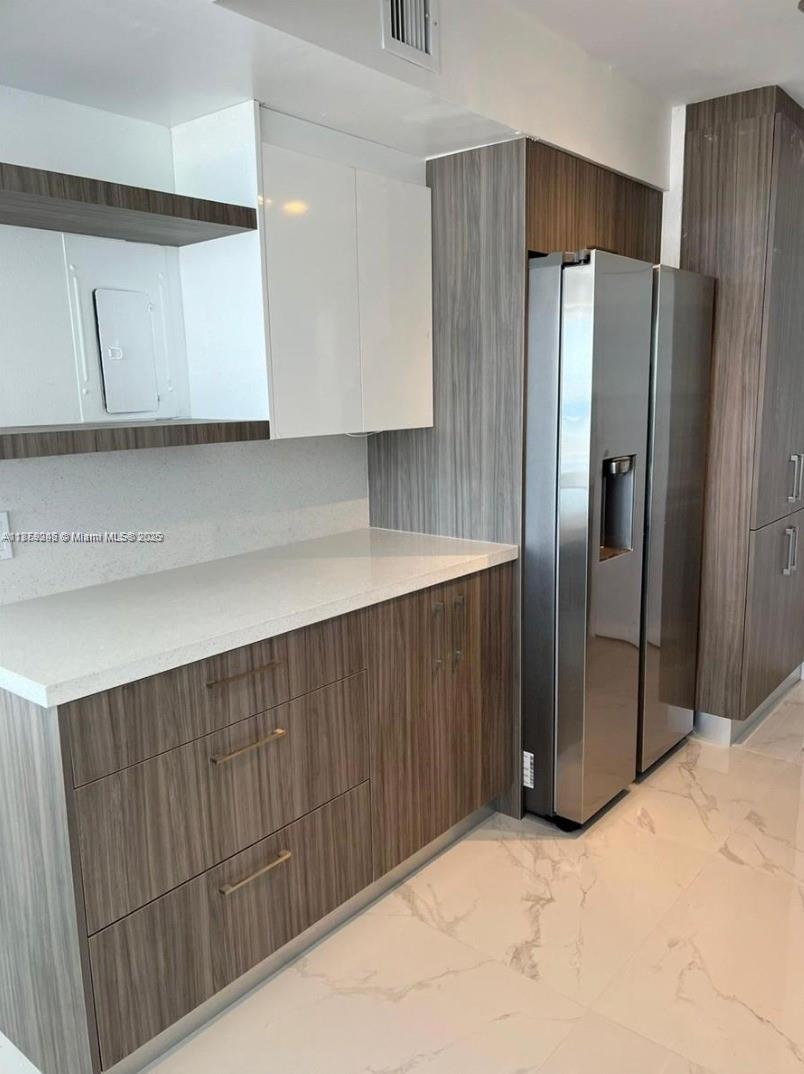 QUADOMAIN TOWER I AND IV - Residential Lease