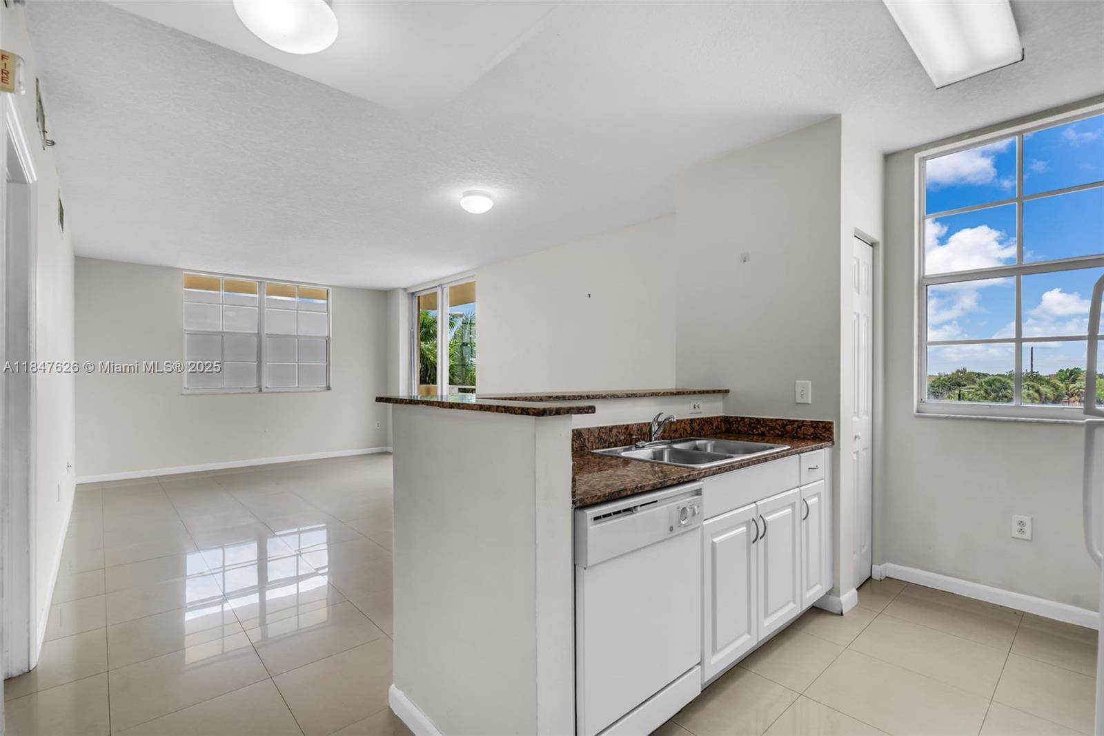 Just Listed! Spacious and bright 2-bedroom, 2-bath corner unit with a desirable split floor plan and exceptional privacy. Enjoy indoor-outdoor living with a wraparound balcony. Each bedroom has its own full bathroom, with one also serving as a convenient guest bath. This unit is located on the same floor as the pool, making it feel like a private resort just steps from your door. A rare opportunity to own a corner unit in a prime location! Washer and dryer inside the unit. Two assigned parking spaces inside the garage. Please note: Building does not allow pets unless it's a registered service animal.