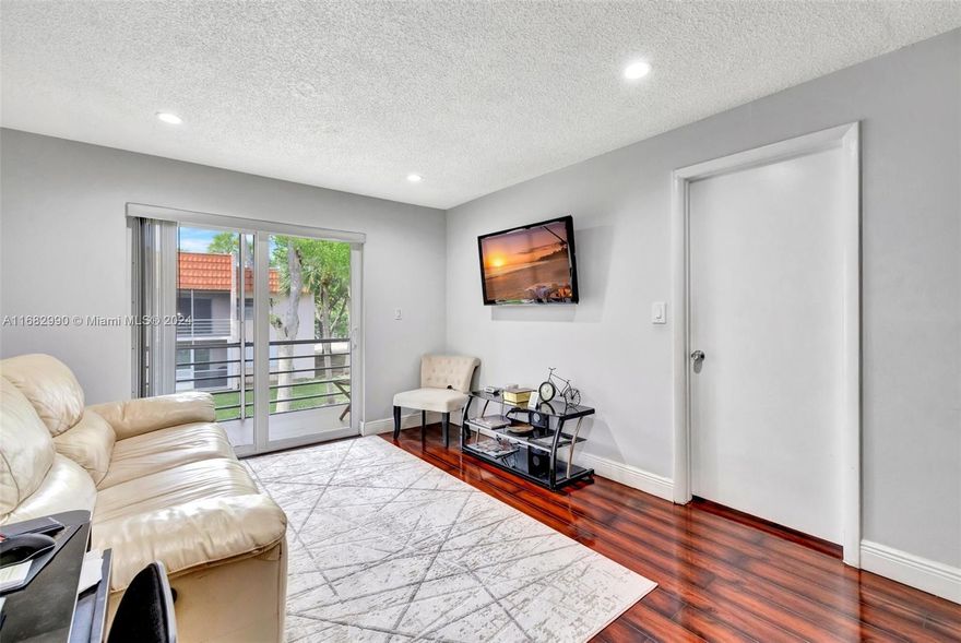 Uncover this rarely available updated unit located on the 2nd Floor in the Countryside Complex in Davie right off of Stirling Rd. Enjoy peace of mind with hurricane impact windows, offering added security and energy efficiency. Come inside to find seamless laminate flooring throughout the living room, dining room, and bedrooms, adding a modern & cohesive touch. The kitchen boasts sleek granite countertops & pristine white cabinetry, perfect for culinary enthusiasts. The 5-year-old roof ensures long-lasting protection, while the recently replaced 2022 water heater adds convenience & reliability. For comfort year-round, the 2009 AC system is well-maintained & ready to go. Don’t miss the chance to own a home where style meets functionality!