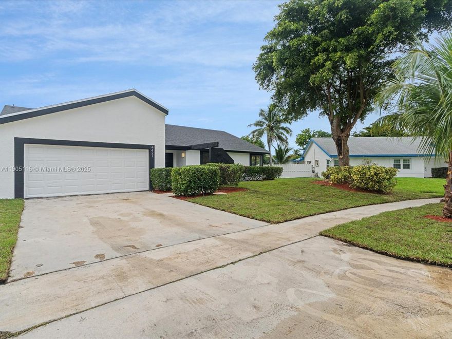 This completely renovated 3-bedroom, 2-bath house features a spacious living area perfect for hosting and entertaining. It boasts a new roof, a resurfaced pool, and a beautiful tiki hut bar. The stunning new kitchen is equipped with all stainless steel appliances, and all bathrooms have been tastefully renovated. The home also includes a large two-car garage, brand new central air conditioning, beautiful vaulted ceilings, and a dedicated laundry room. Located in a quiet neighborhood with young families, it offers a perfect blend of comfort and community. Conveniently situated just minutes from shopping, dining, entertainment, and diverse houses of worship, this home combines modern upgrades with a welcoming atmosphere.