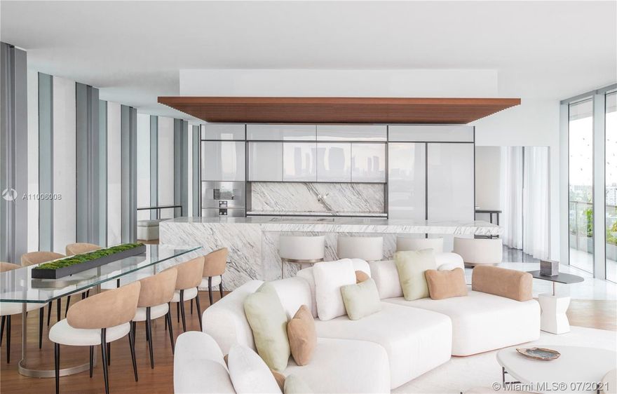 Composed of 59 individually designed waterfront residences around a glittering lagoon, Monad Terrace by Pritzker Winner, Jean Nouvel, provides brilliant light, private outdoor space, climbing gardens, unique sawtooth honeycomb facades & stunning sunset views of Biscayne Bay. Kitchens with dramatic sculptural marble island in Calacatta. Master baths with richly veined, spacious stone countertops, marquetry flooring and tiled walls. Other notable features include custom cabinetry & built-in features, designer fixtures, teak flooring throughout & private elevators. Immediate Occupancy. Photos and Renderings are from model residences.