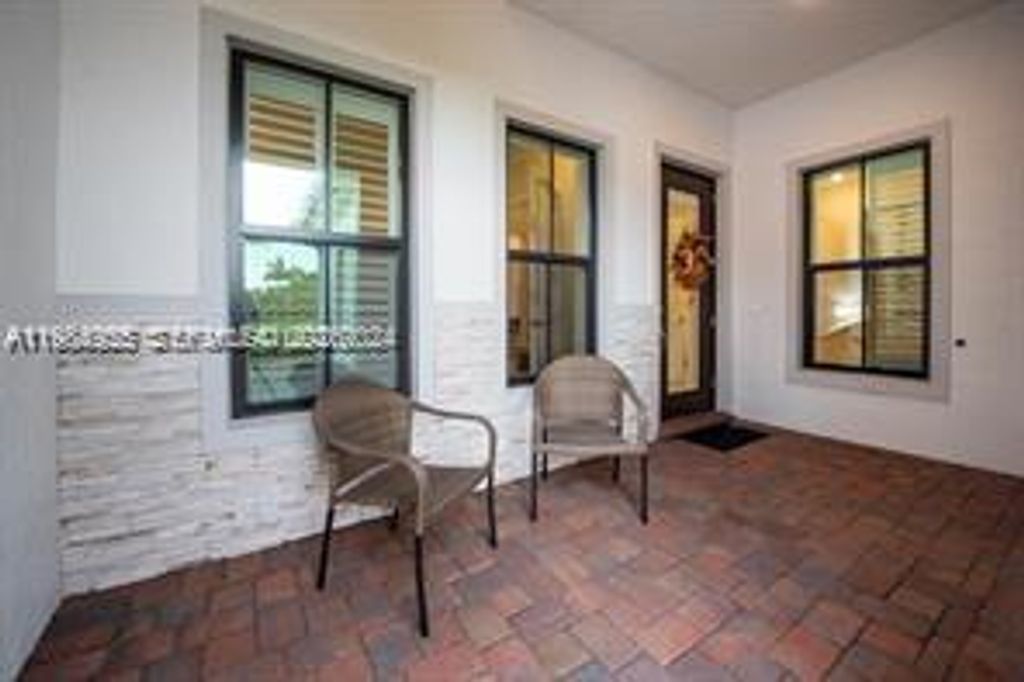 Photo of 7637 S Blue Spring Dr #7637, Parkland, FL 33067 (MLS # A11984955)