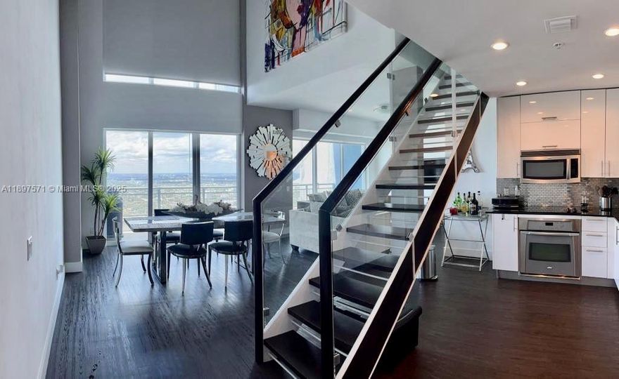 Fully furnished and ready to move in—this high-floor unit at Infinity at Brickell offers incredible west-facing views where you can enjoy Miami’s best sunsets. Located above the 40th floor, it offers exclusive access to the rooftop amenities available only to select floors. The amenities include a gym, lap pool, cold plunge, spa, social room with a pool table, yoga room, sauna, and meeting room. The building also features a gourmet coffee by Branca Cafe and a pet salon downstairs. Internet and water are included in the HOA. Truly one of the best locations in Brickell—right across from Southside Elementary and just steps to Publix, restaurants, and everything you need. This is a lifestyle, not just a condo. For further info, please SMS ONLY to Agent.