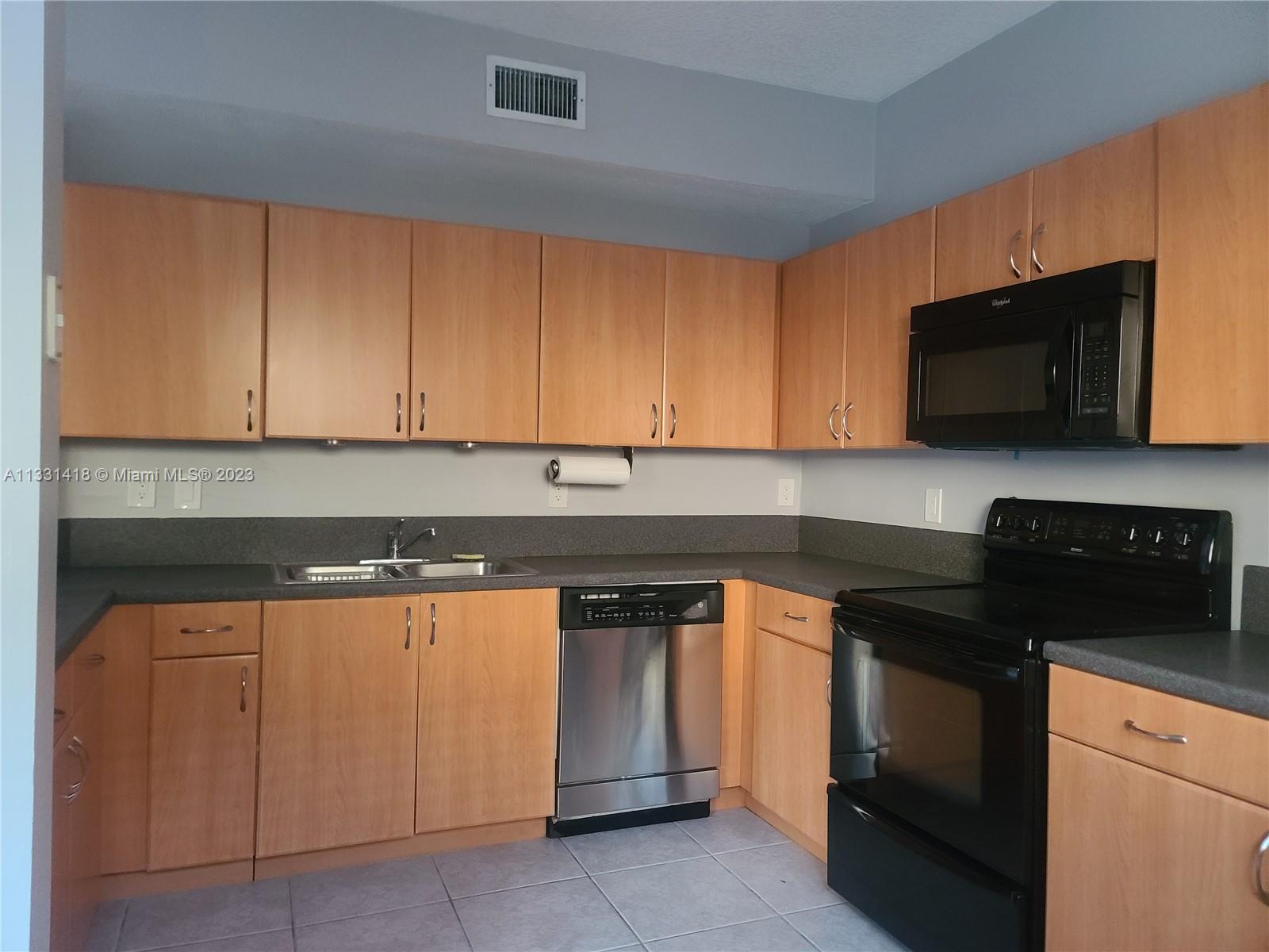 KENDALL VILLAGE TOWNVILLA - Residential