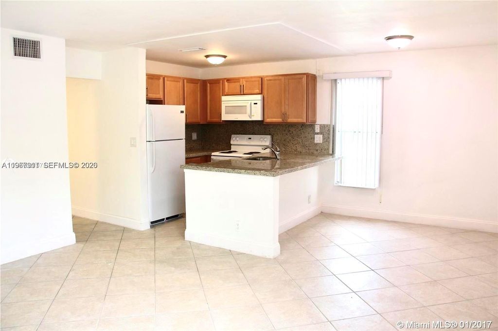 Photo of 3004 Coral Ridge Dr #110B, Coral Springs, FL 33065 (MLS # A11967911)