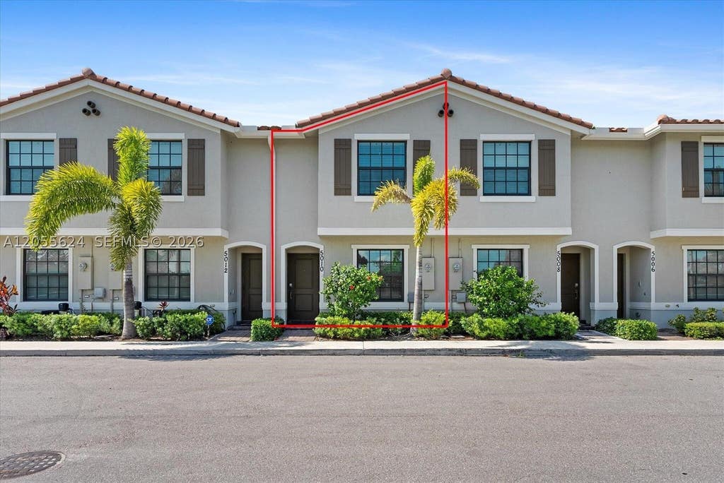 Photo of 5010 Genove Pl #5010, Riviera Beach, FL 33410 (MLS # A12055624)