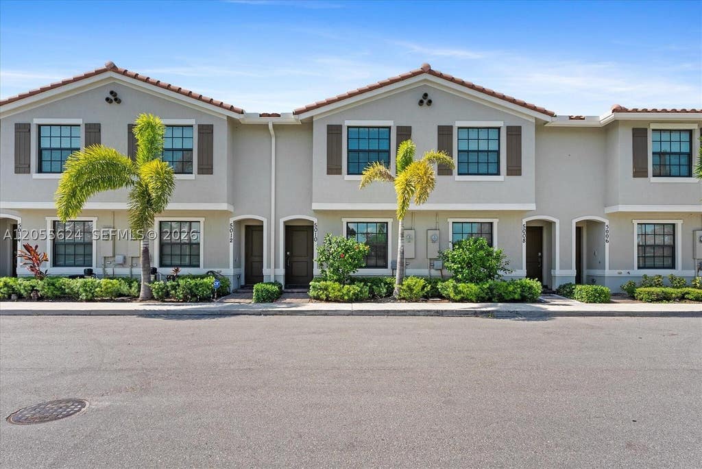 Photo of 5010 Genove Pl #5010, Riviera Beach, FL 33410 (MLS # A12055624)