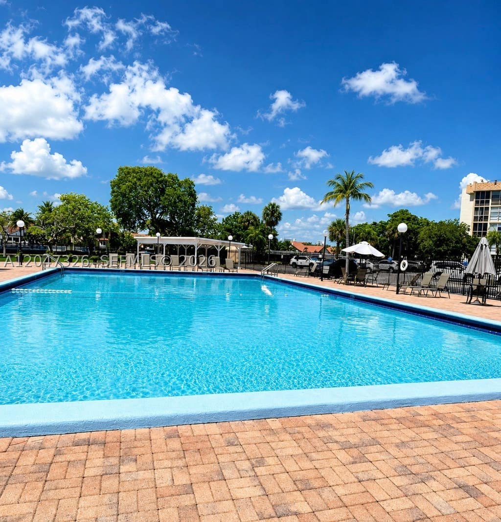 Photo of 801 Three Islands Blvd #107, Hallandale Beach, FL 33009 (MLS # A12047326)