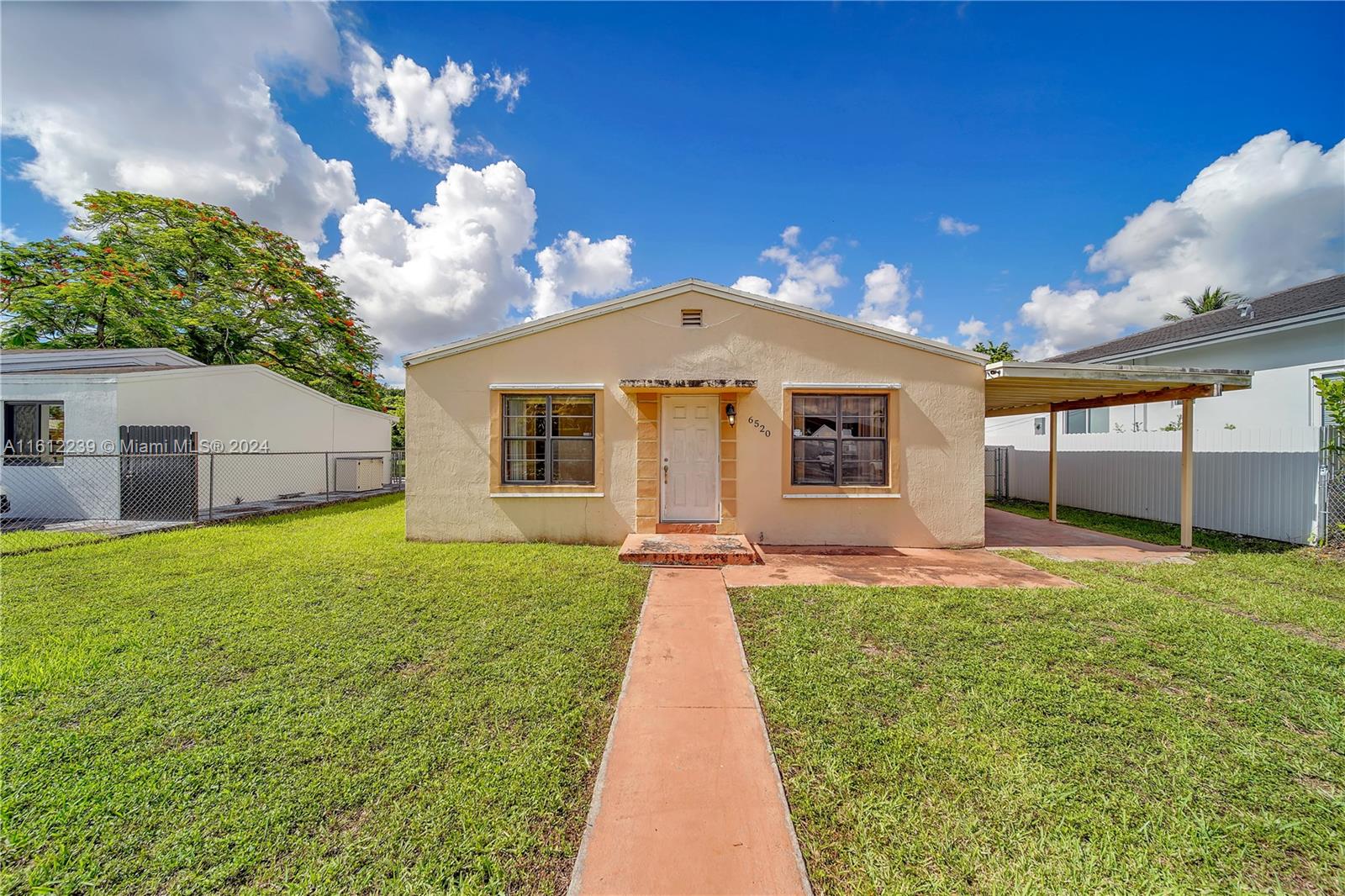 Discover the potential of this 3-bedroom, 2-bathroom home on an expansive 8,900 sq ft lot, perfectly situated in a prime location. An incredible opportunity awaits for renovators or developers to create something truly special.