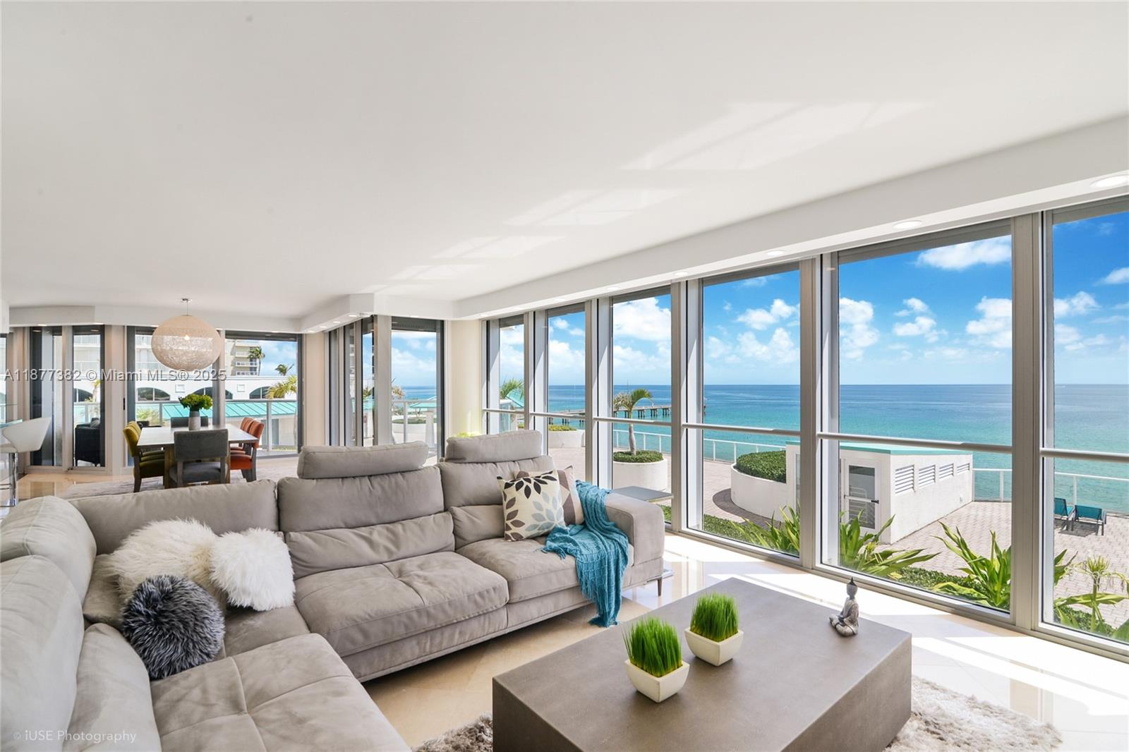 Enjoy breathtaking direct ocean views from this updated 2 bed+den/2.5 bath home. The open kitchen is stylish and sleek with high-gloss white cabinets, smooth black quartz counters and stainless steel appliances. LED dimmable lighting sets the mood for informal or formal dining at the breakfast nook, island counter or the 8 person dining table. The spacious master bedroom suite features balcony access, walk-in closet and bathroom with a deep soaking tub and double person railhead shower. Amenities include health club & spa, full service private beach club with lounge chairs and towel service, fitness classes, 2 oceanfront restaurants, beauty salon, racquetball court, 2 oceanfront restaurants, tennis, marina & more! Unit is currently tenant occupied. Please allow 24-48 hour notice.