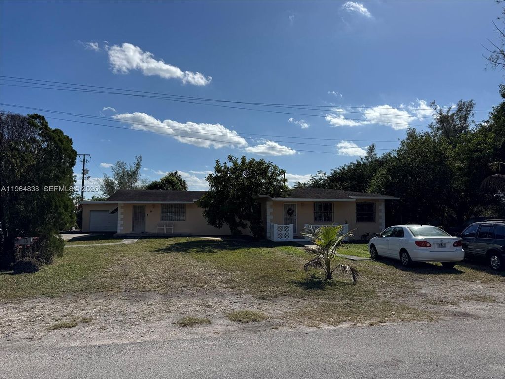Photo of 36 NW 151st St, Miami, FL 33169 (MLS # A11964838)