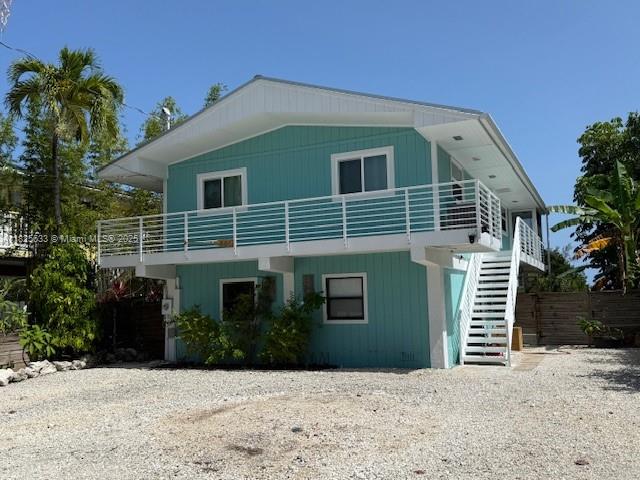 Dream Home with 50ft water access with a floating dock and direct access on a wide canal! Welcome to your ultimate fishing retreat in the Florida Keys! This 2 bedroom 2 bath Keys style home just 1 hour from Miami with beautiful views from the open concept kitchen and living room. Have your morning coffee outside on your screened patio overlooking the canal. The bottom floor has a large enclosed area for storage or could also be great to entertain.