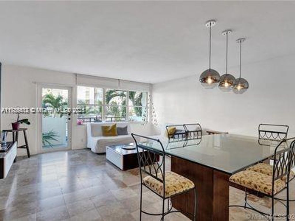 Photo of 401 Golden Isles Dr #201, Hallandale Beach, FL 33009 (MLS # A11785512)