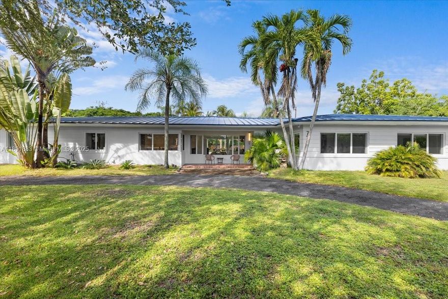 Disconnect from FPL and enjoy true energy independence in this solar-powered, energy-efficient South Miami home. Designed for modern living, it features elegant 48x48 porcelain tile floors, bright open spaces, and a sleek kitchen with top-of-the-line stainless-steel appliances. The seamless layout opens to a private backyard oasis with a sparkling pool, covered patio, and summer kitchen—perfect for entertaining. Conveniently located near top schools, parks, Coral Gables, and the University of Miami. Per the owner, the home is larger than reflected on the tax roll.