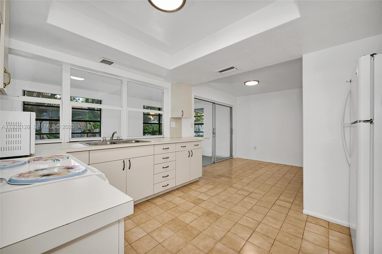 View photos, virtual tours, details... 2311 NW 73rd Ave