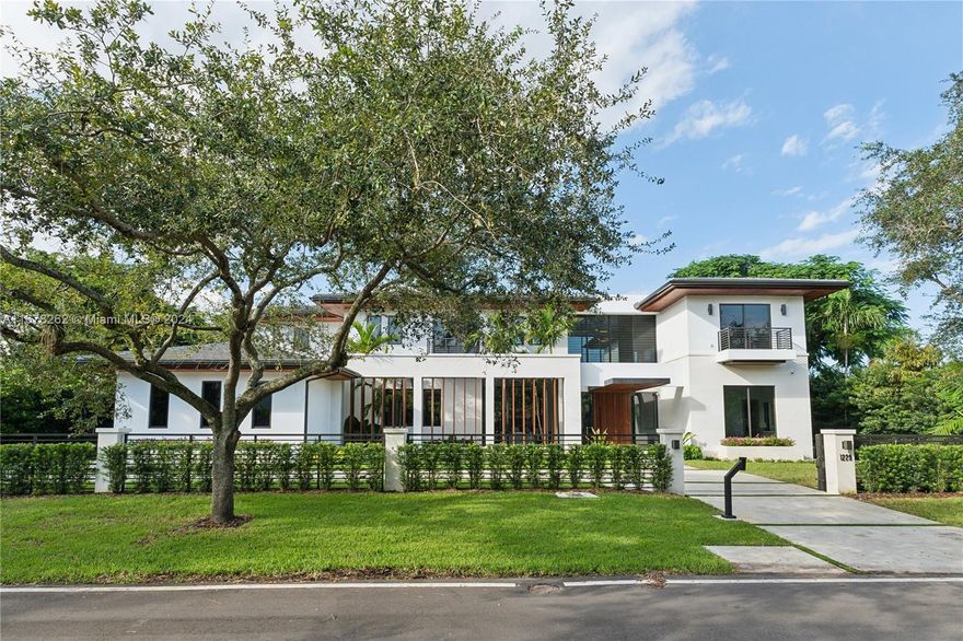NOW COMPLETED! Welcome to the newest and most spectacular new construction home in the highly coveted South Gables neighborhood. This Tropical Modern residence home was designed by renowned architect Giorgio Balli and sits on an expansive 17,691 sq foot lot on a quiet picturesque Andora Avenue in South Gables, walking distance to Coconut Grove, Ponce Davis, and South Miami. This custom home features a perfectly executed and thoughtfully designed floor plan with 6,090 sq ft of living space and a total of 7,202 square footage. Executed with tremendous attention to detail this 7 Bed/ 7.5 Bath features expansive living areas, 12-foot ceilings, floor-to-ceiling windows, custom millwork, exterior water features, cumaroo wood detailing and much more.