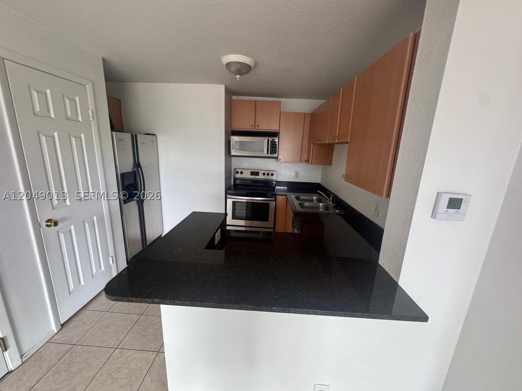Photo of 1780 Palm Cove Blvd #6-306, Delray Beach, FL 33445 (MLS # A12049013)