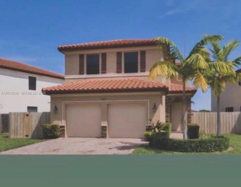 Photo of 2401 NE 2nd Dr, Homestead, FL 33033 (MLS # A12012545)