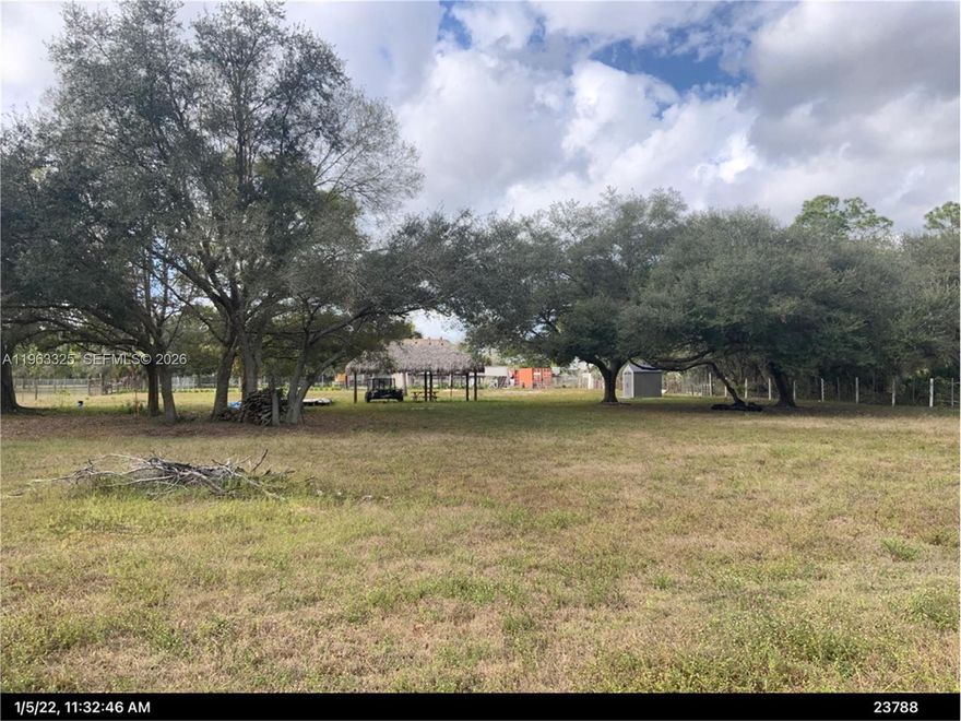 1.25-acre fenced lot in Montura Ranches ready for your country lifestyle. Property features a tiki hut, drilled well with pump included, culvert installed, and nearby electric pole for future hookup. No HOA and animals allowed in this rural residential area. Bring your dreams and enjoy the space and freedom of country living. NO FLOOD ZONE OR WETLANDS! Buyer to do due diligence.