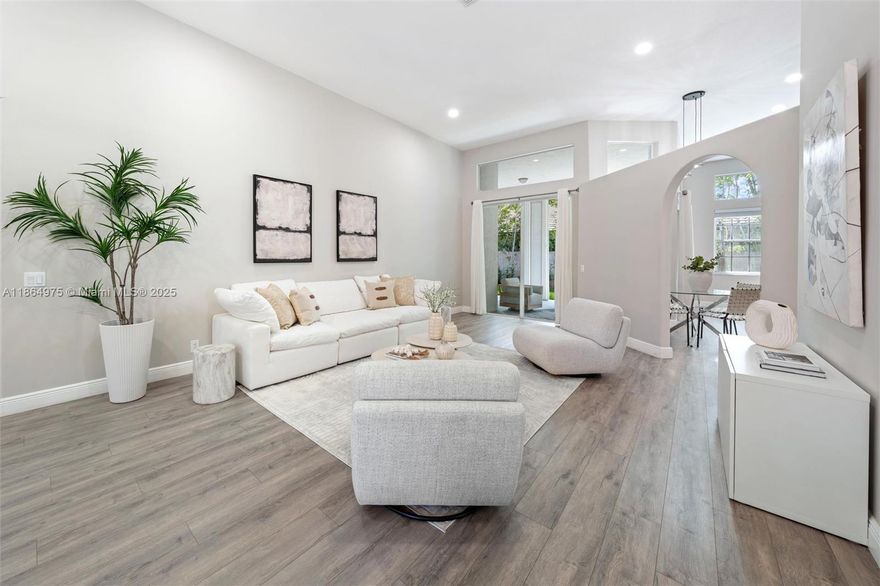 Located in Weston Hills CC, a gated golf-course community with manicured streets, lakes, and neighborhood parks, including Jardin’s playground, basketball and pickleball courts, and a shaded gazebo. This Covington Five has a 2023 roof and a circular paver drive. A triple-split plan delivers 5 bedrooms and 3.5 baths under volume ceilings. A light-filled foyer opens to formal living and dining. The kitchen features wood cabinetry and granite counters and flows to the family room for easy entertaining. The primary suite offers a sitting area, two walk-in closets, and bathroom with dual sinks, a separate tub, and a shower. Outdoors, enjoy a secluded garden retreat. Minutes to top-rated schools, dining, the Cleveland Clinic, and FTL Airport.