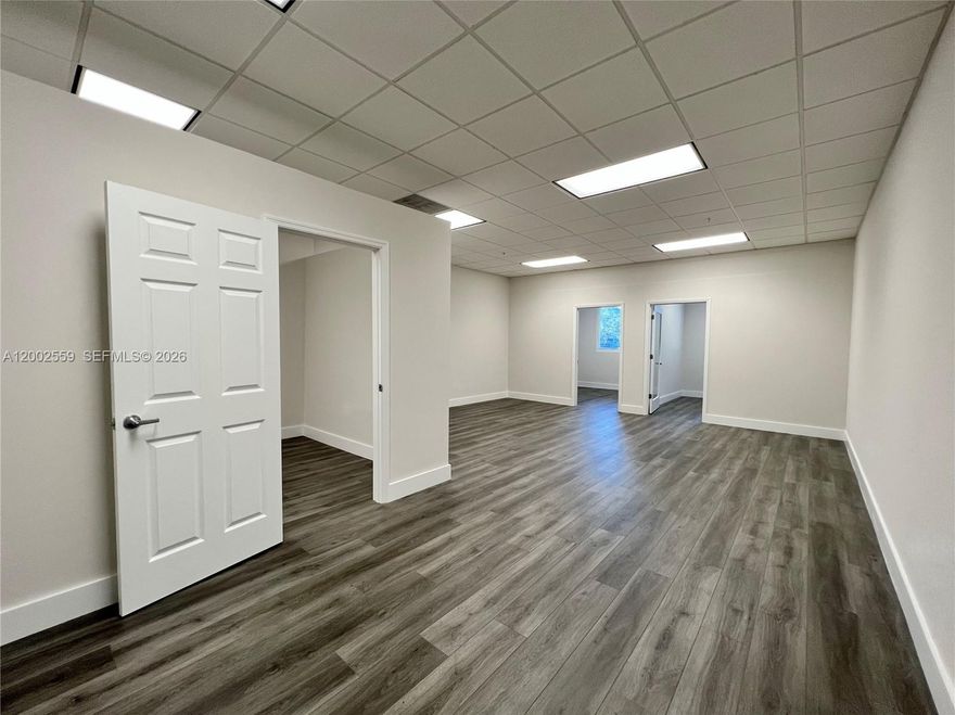 Ground level office suite located in Palmetto West Park lll. Two private offices with additional room that may be used as conference, record room, and or other private work station. Open floor component also allows for tenant to design for their best use. Freshly painted and new vinyl flooring. Office building offers : Grand Entrance Lobby, Common Conference Room Area, and Restaurant Cafe along with ample parking.